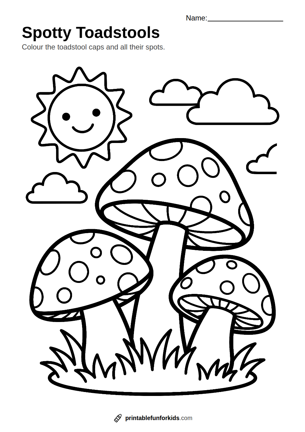 Line drawing of three spotty toadstools growing in the grass, ready to colour in