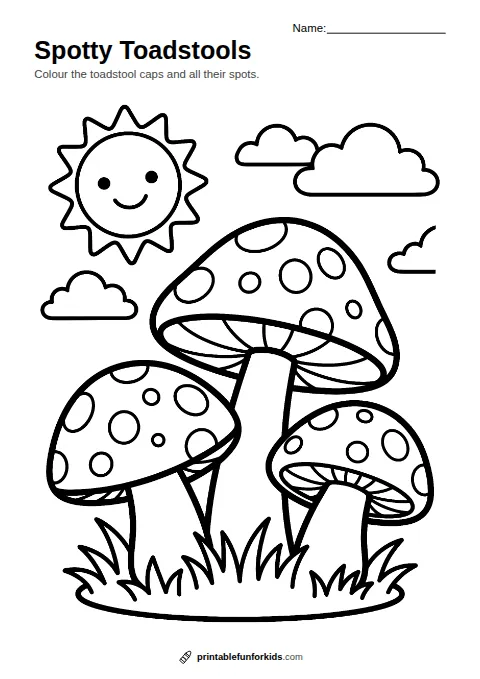 Line drawing of three spotty toadstools growing in the grass, ready to colour in